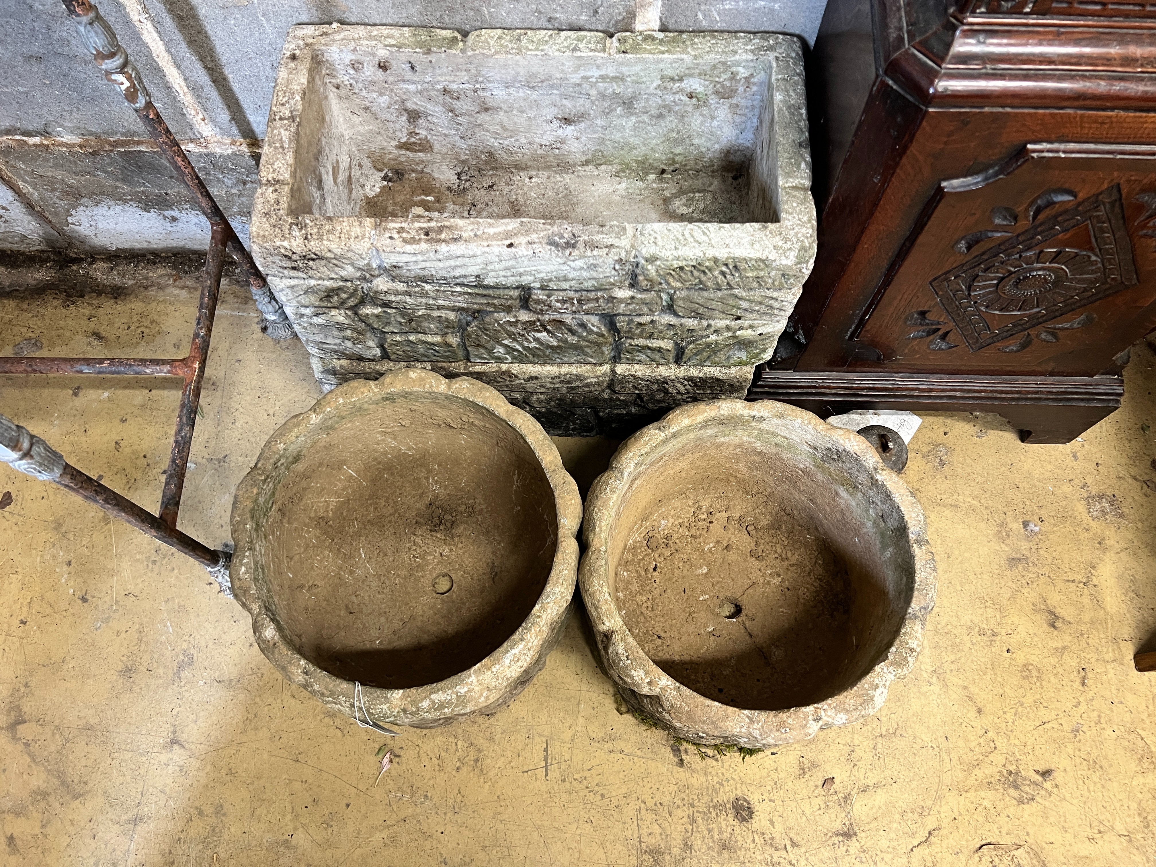 A pair of circular reconstituted stone garden planters, diameter 31cm, height 25cm together with a pair of rectangular planters